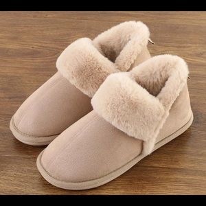 Brand new alpaca slippers with memory foam.